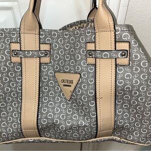GUESS purse with Leopard design on the inside